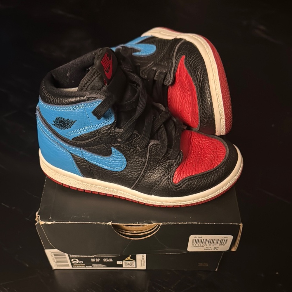 Jordan 1 Black and Red High-Top Sneakers
